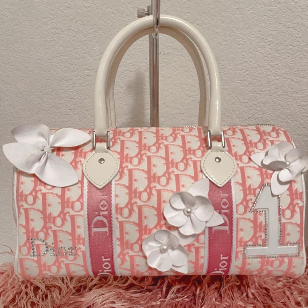 This is an authentic CHRISTIAN DIOR Monogram Girly Boston in Pink.